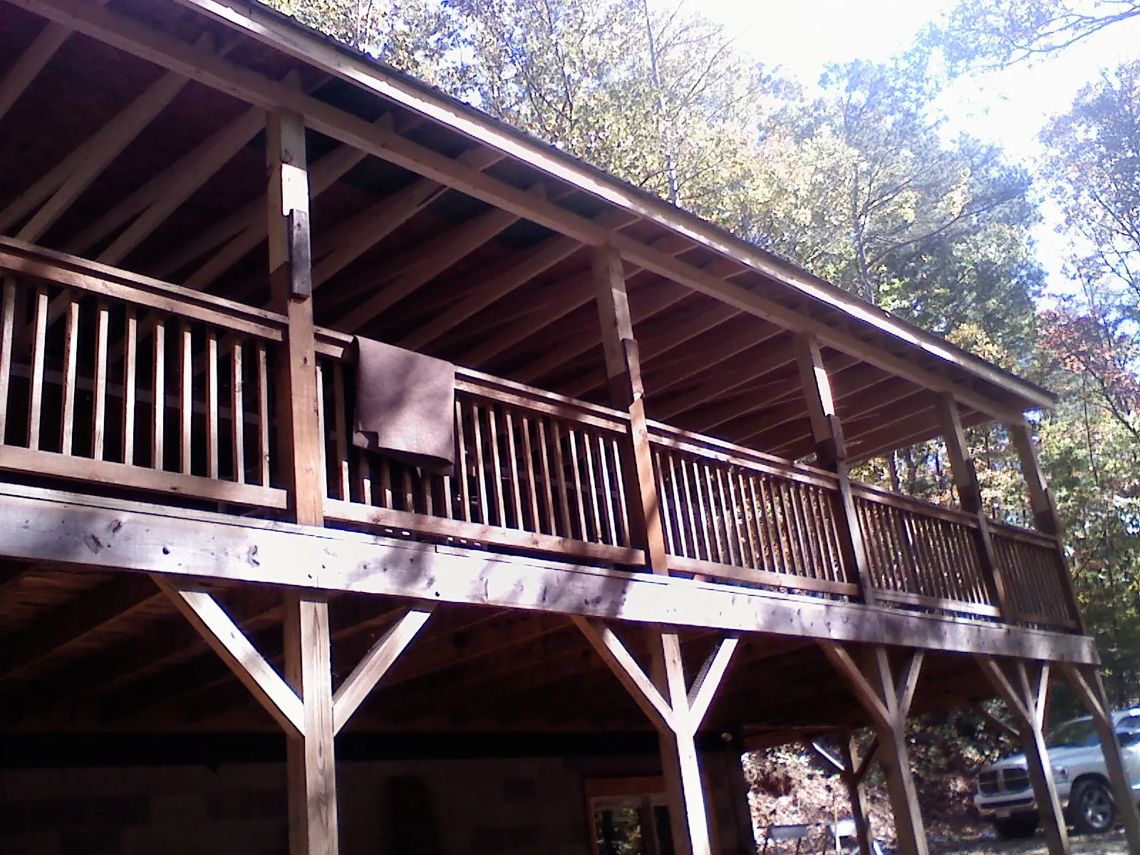 Timber framing under a new elevated porch and deck — Roof Leak Repair in Allen Park by Roofing Brothers